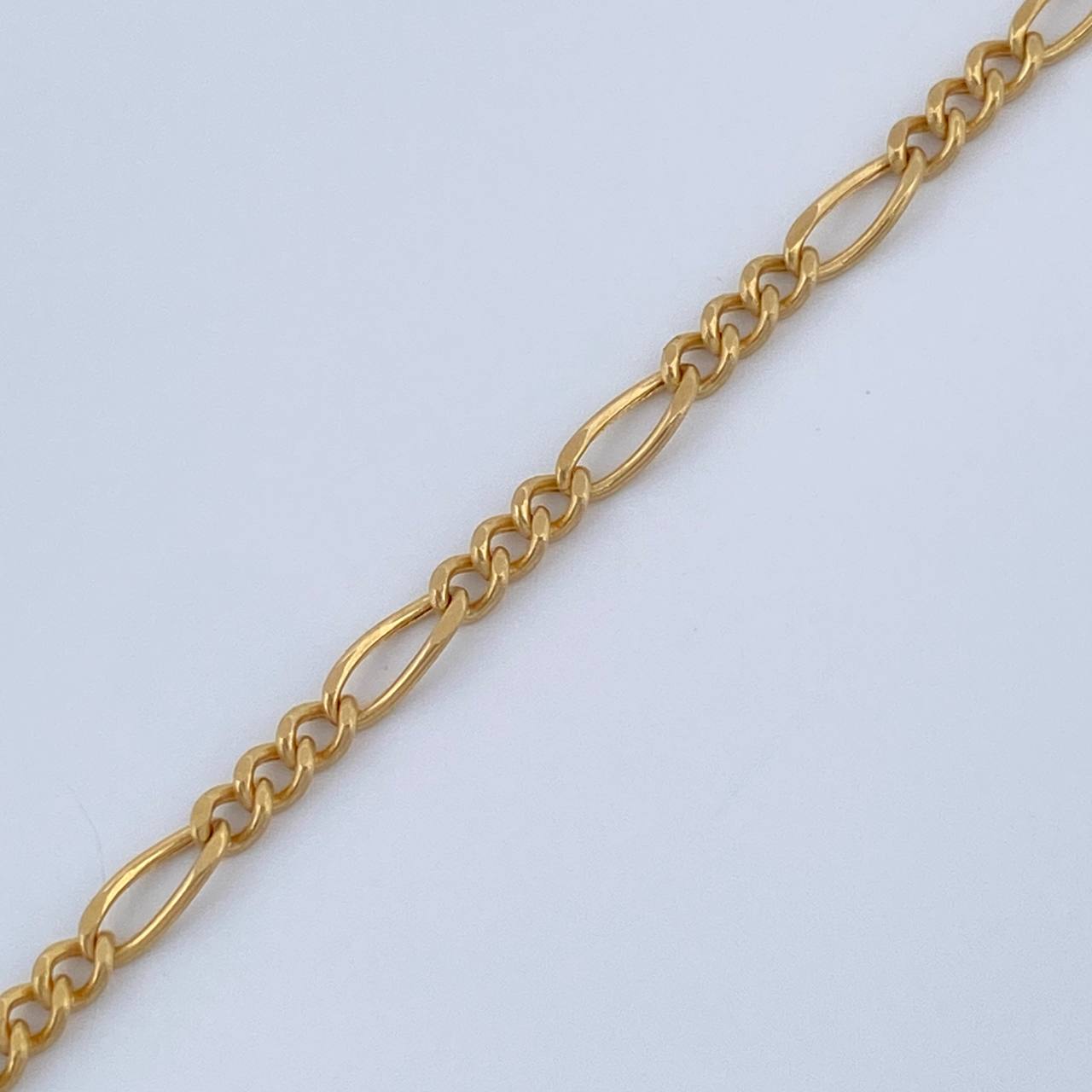 Pulso Figaro 0.9gr / 7 in / 1.8mm Oro Amarillo +1 18K $