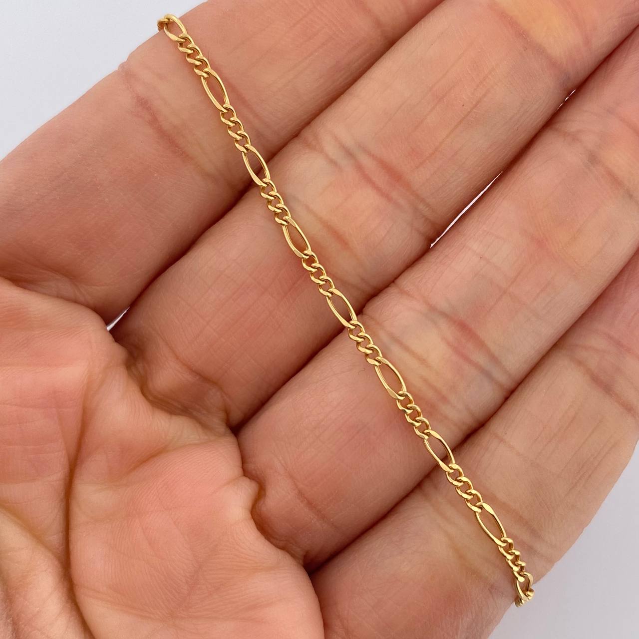 Pulso Figaro 0.9gr / 7 in / 1.8mm Oro Amarillo +1 18K $