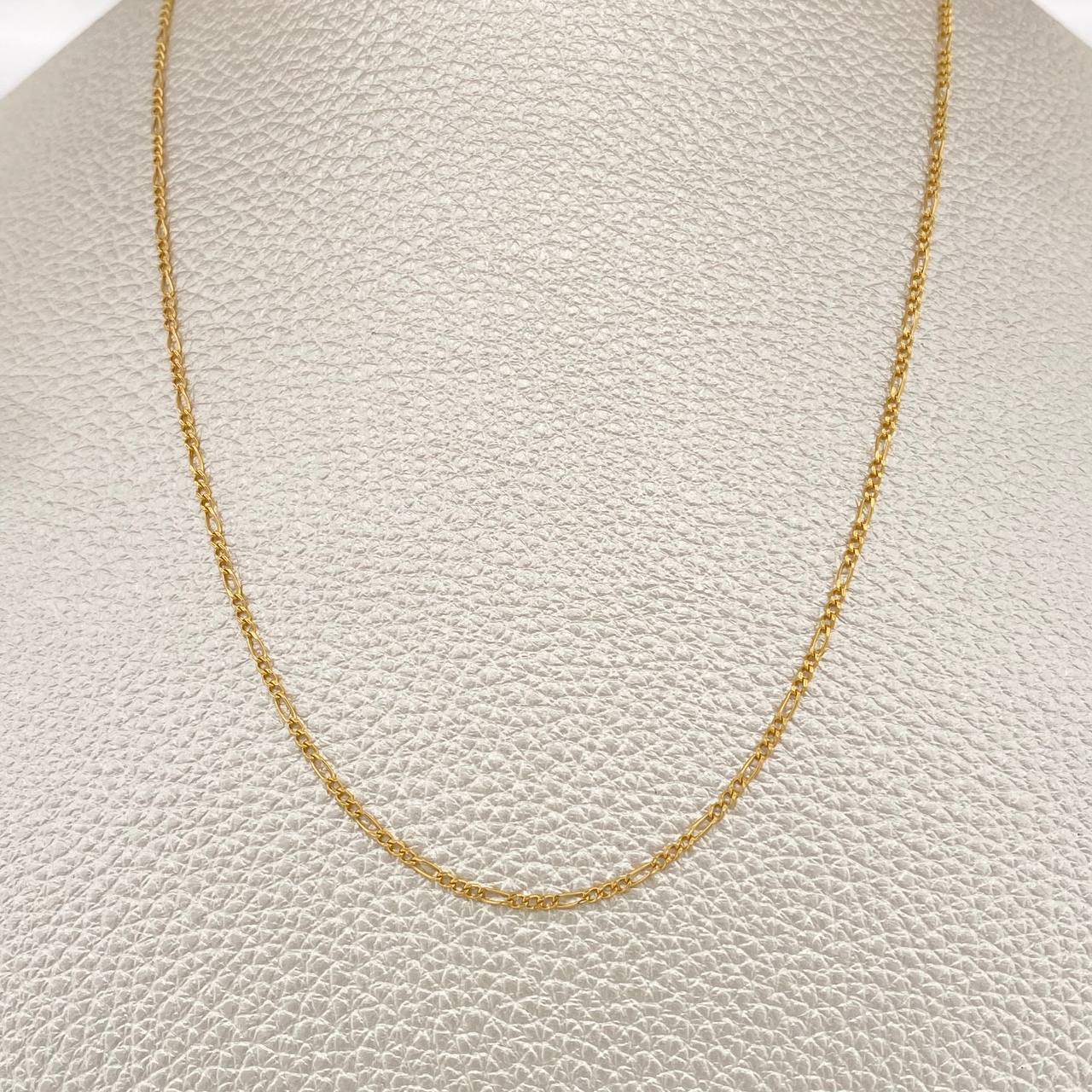 Figaro Chain 1.3gr / 23 1/2 in / 1.31mm Yellow Gold +1 18K %