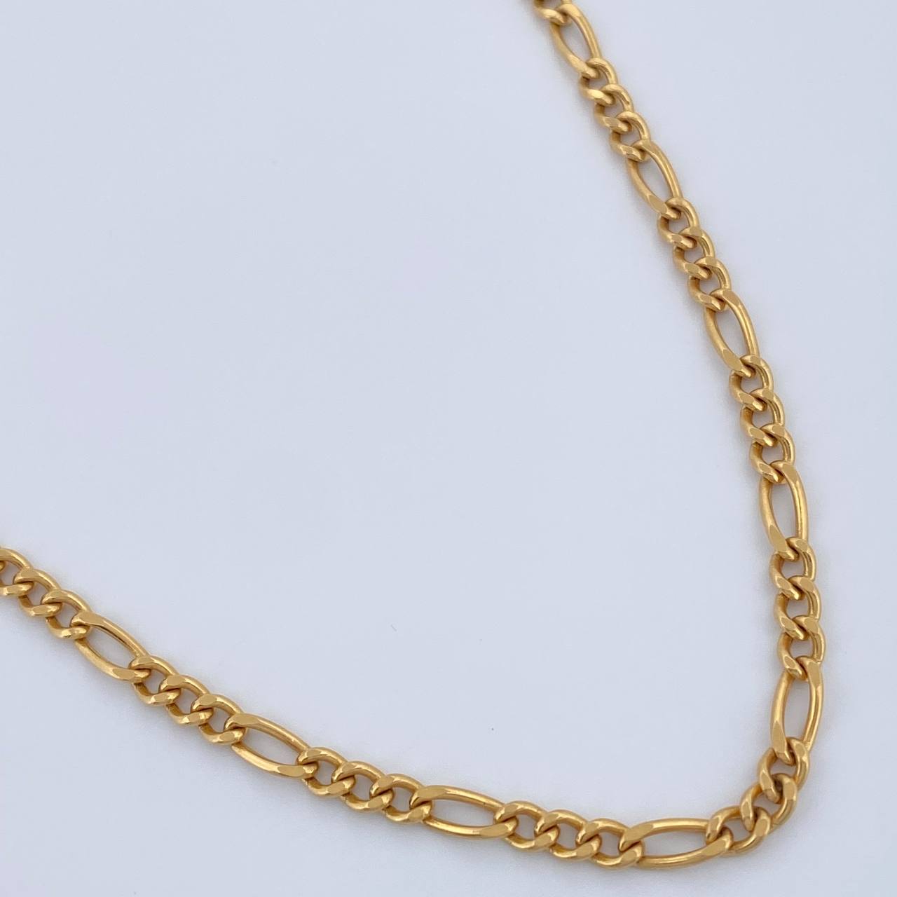 Cadena Figaro 7gr / 23 3/4 in / 3mm Oro Amarillo +1 18K $