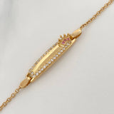 Pulso Placa Bebe Aro Seguido Corona 2.8gr / 4 1/2 in / 0.7mm Oro Amarillo 18K %