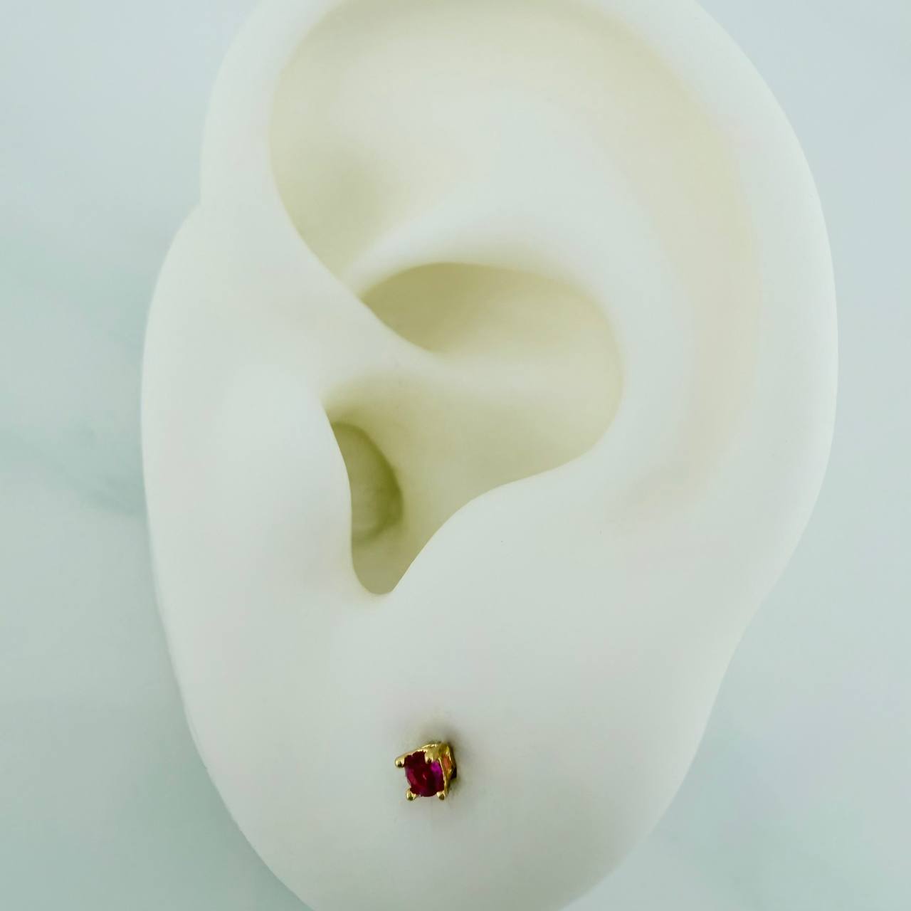 Topos Chispa 0.5gr / 1mm Oro Amarillo 18K &