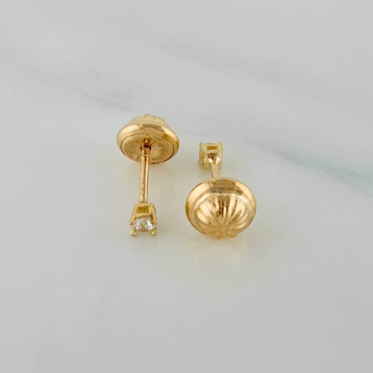 Topos Chispa 0.5gr / 1mm Oro Amarillo 18K &