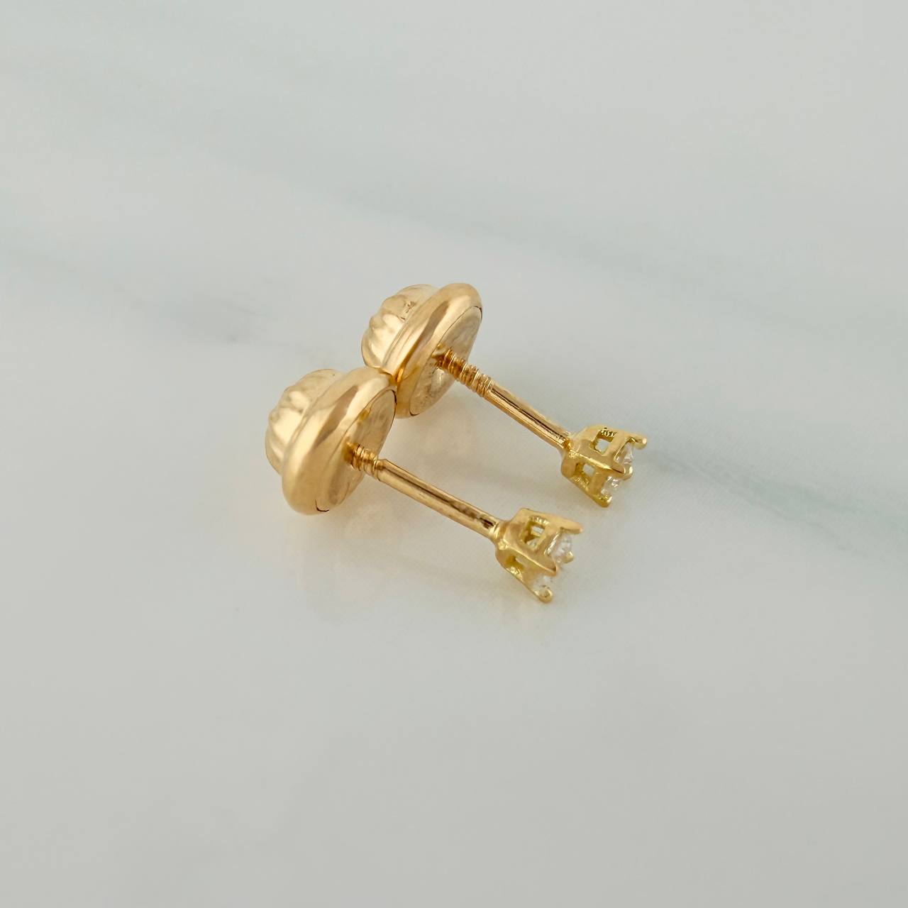 Topos Chispa 0.5gr / 1mm Oro Amarillo 18K &