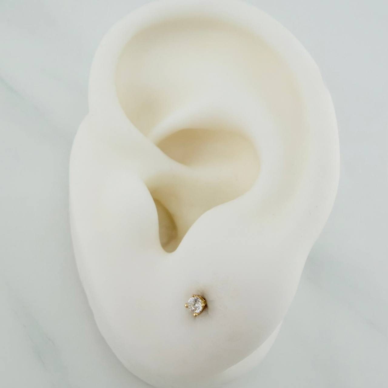 Topos Chispa 0.5gr / 1mm Oro Amarillo 18K &