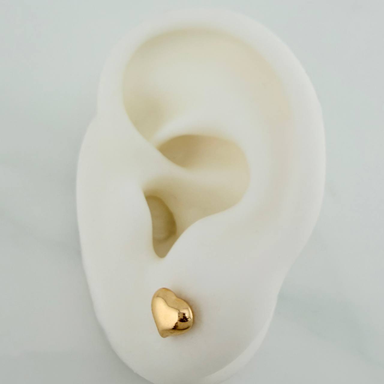 Topos Corazon 0.7gr / Oro Amarillo 18K &