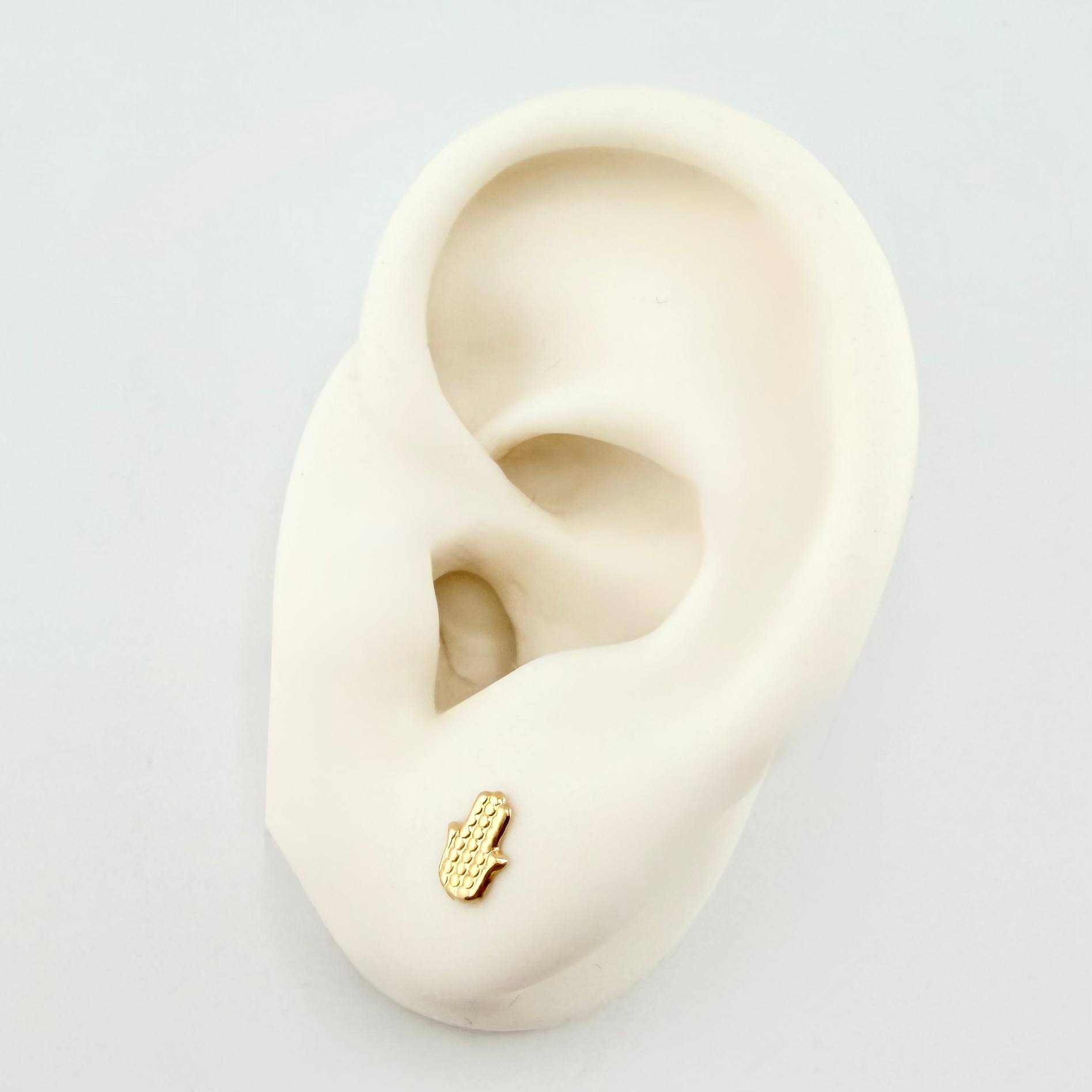 Topos Mano Hamsa 0.55gr / 7.1mm Oro Amarillo 18K