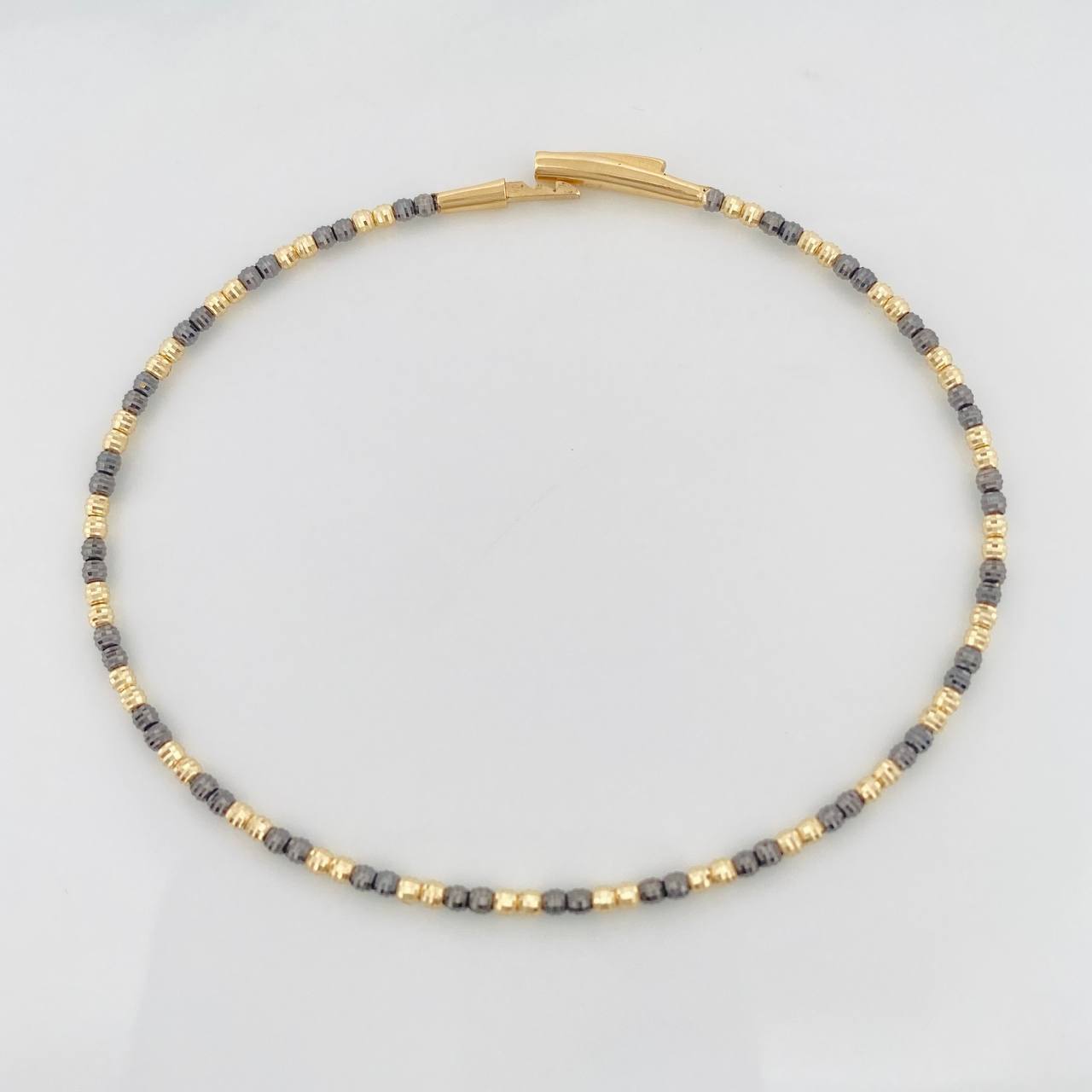 Diamond Cut Hoop Bracelet 2.85 g / 6 3/4 in / 1.65 mm Two-Tone Black Yellow 18K Gold