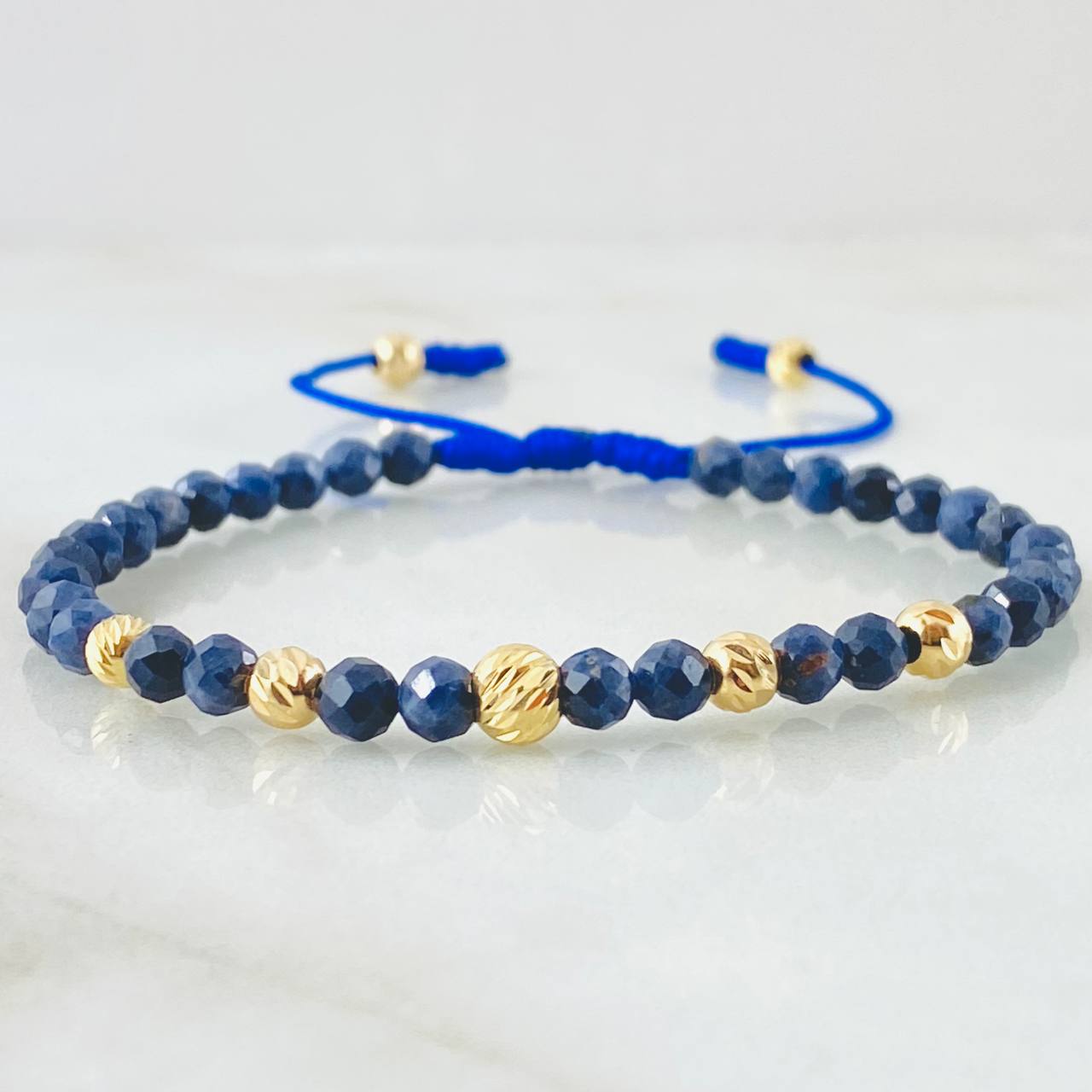 Blue Celestial Sapphire Bracelet 5mm-4mm 7 pcs 18K Yellow Gold (A.C)