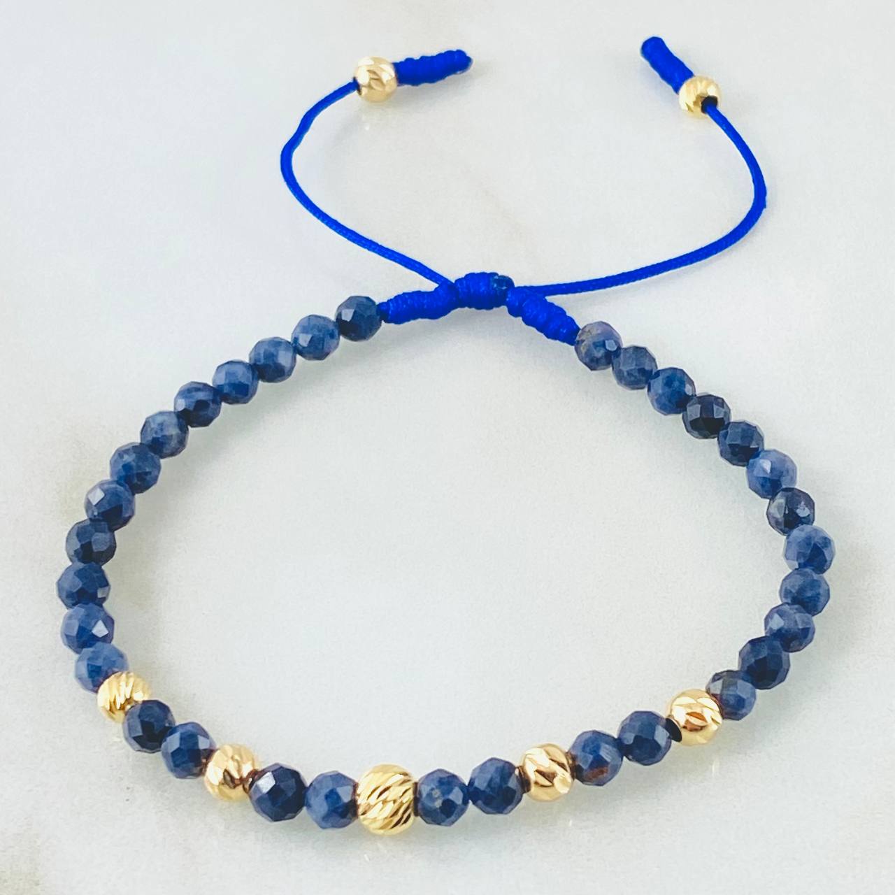 Blue Celestial Sapphire Bracelet 5mm-4mm 7 pcs 18K Yellow Gold (A.C)