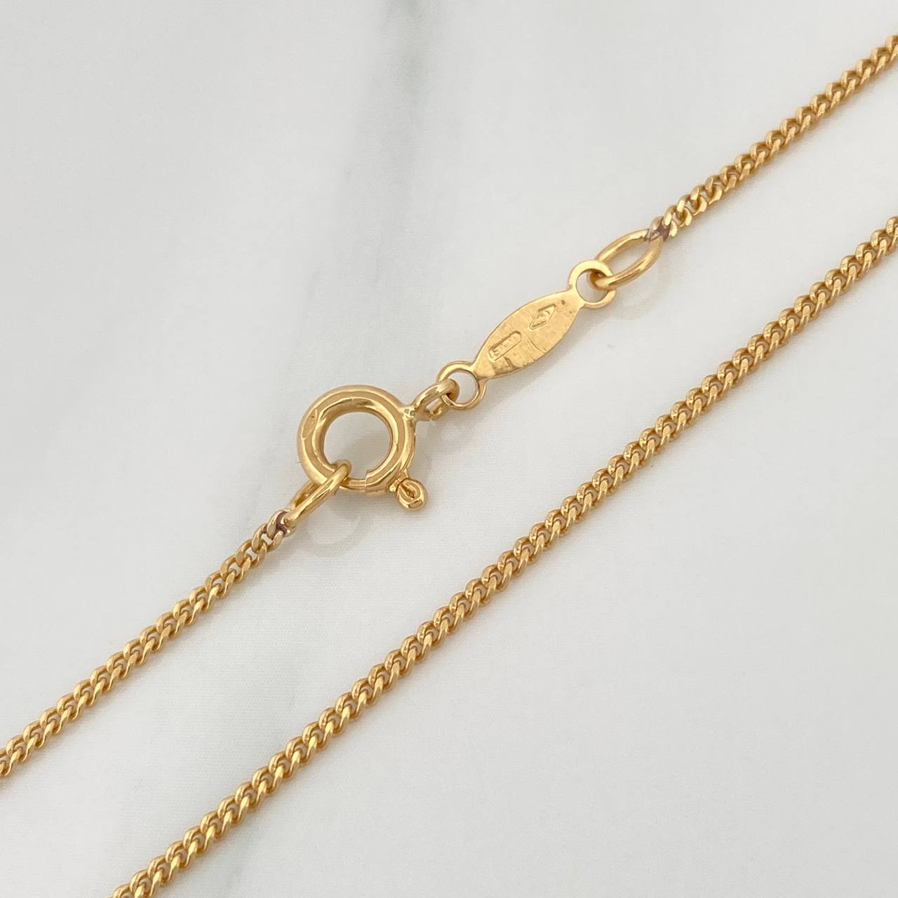 Cadena Cubana 3.3gr / 16 1/4 in / 1.4mm Oro Amarillo +1 18K $