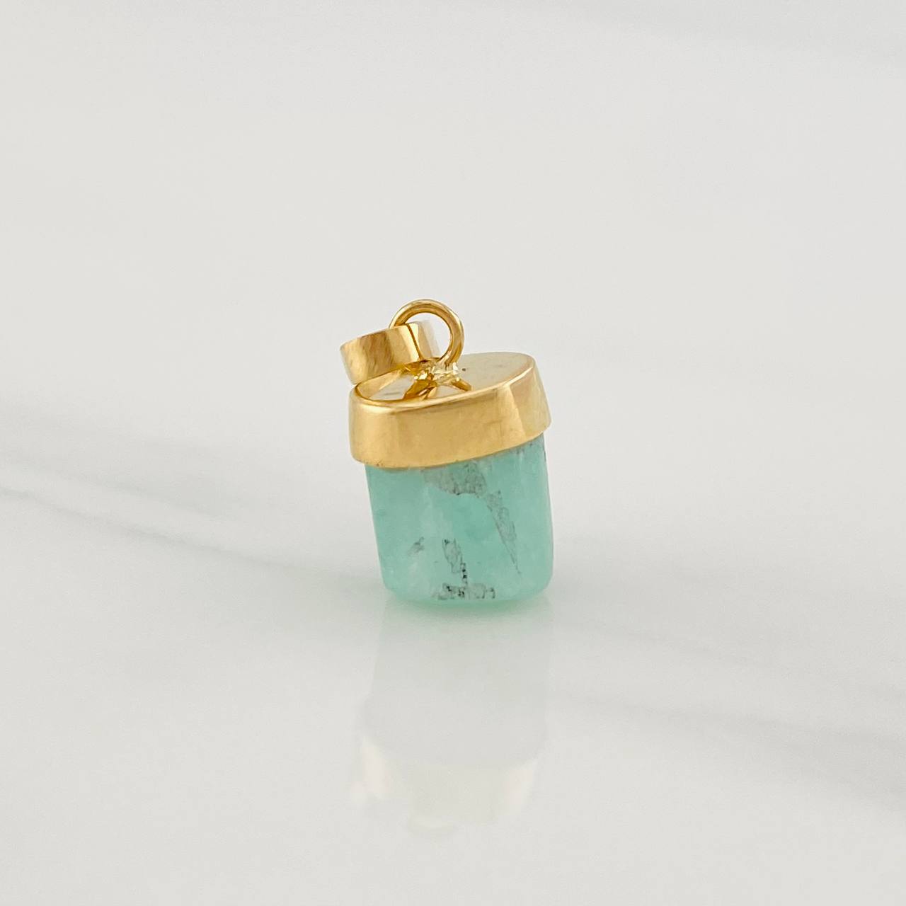 Dije Morralla Esmeralda 0.4g / 1/2 in Oro Amarillo 18K