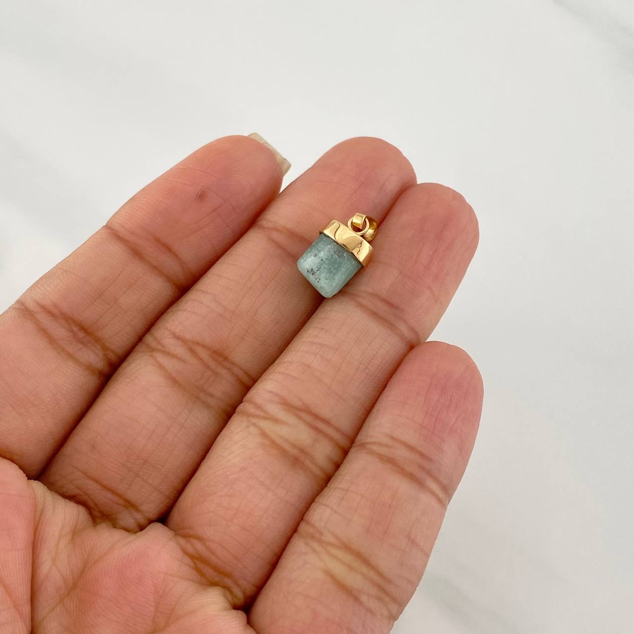 Dije Morralla Esmeralda 0.4g / 1/2 in Oro Amarillo 18K