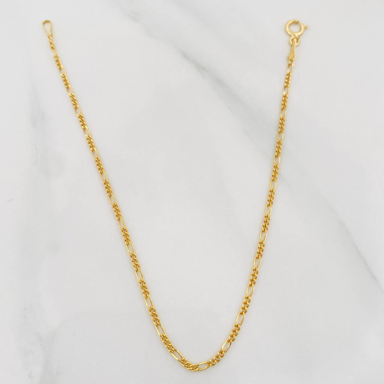 Pulso Figaro 0.75 g / 7 1/2 in / 1.5 mm Oro Amarillo 18K