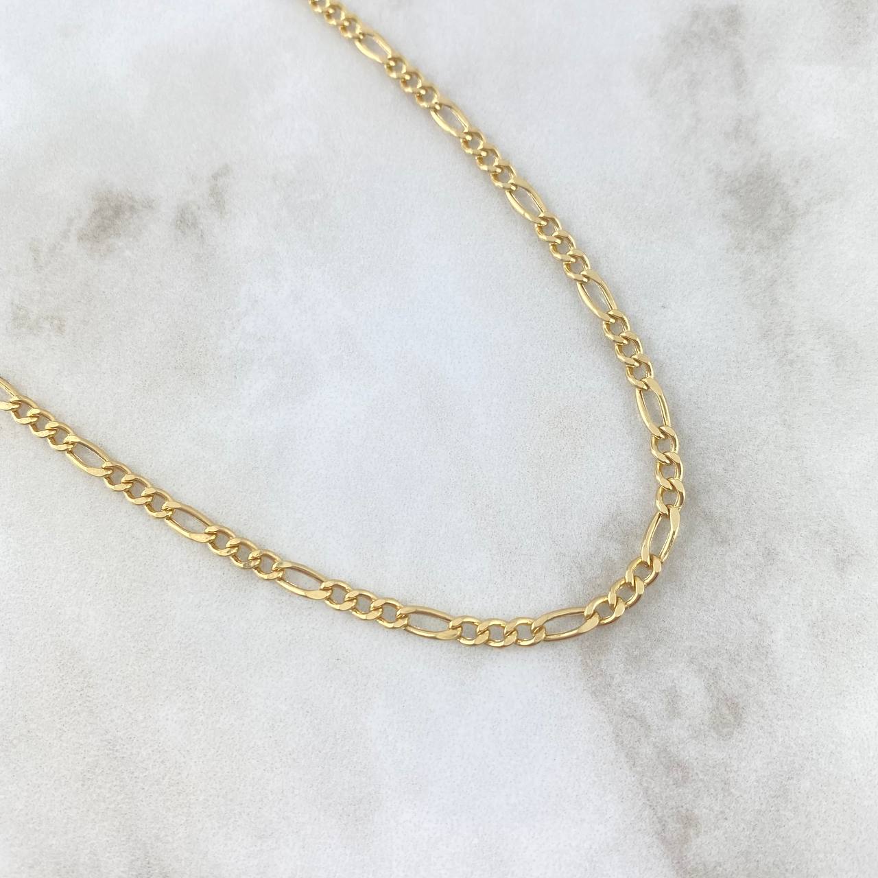 Cadena Figaro 6.45gr / 23 1/2 in / 3.2mm Oro Amarillo +1 18K