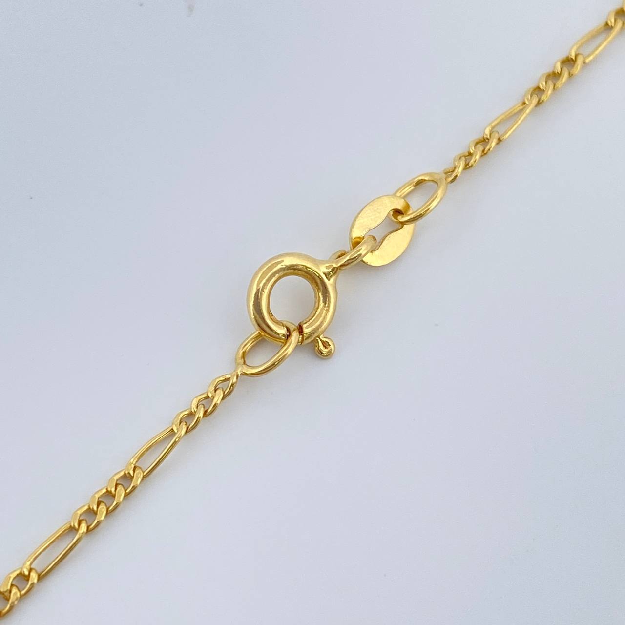 Cadena Figaro 1.45gr / 19 3/4 in / 1.43mm Oro Amarillo +1 18K %