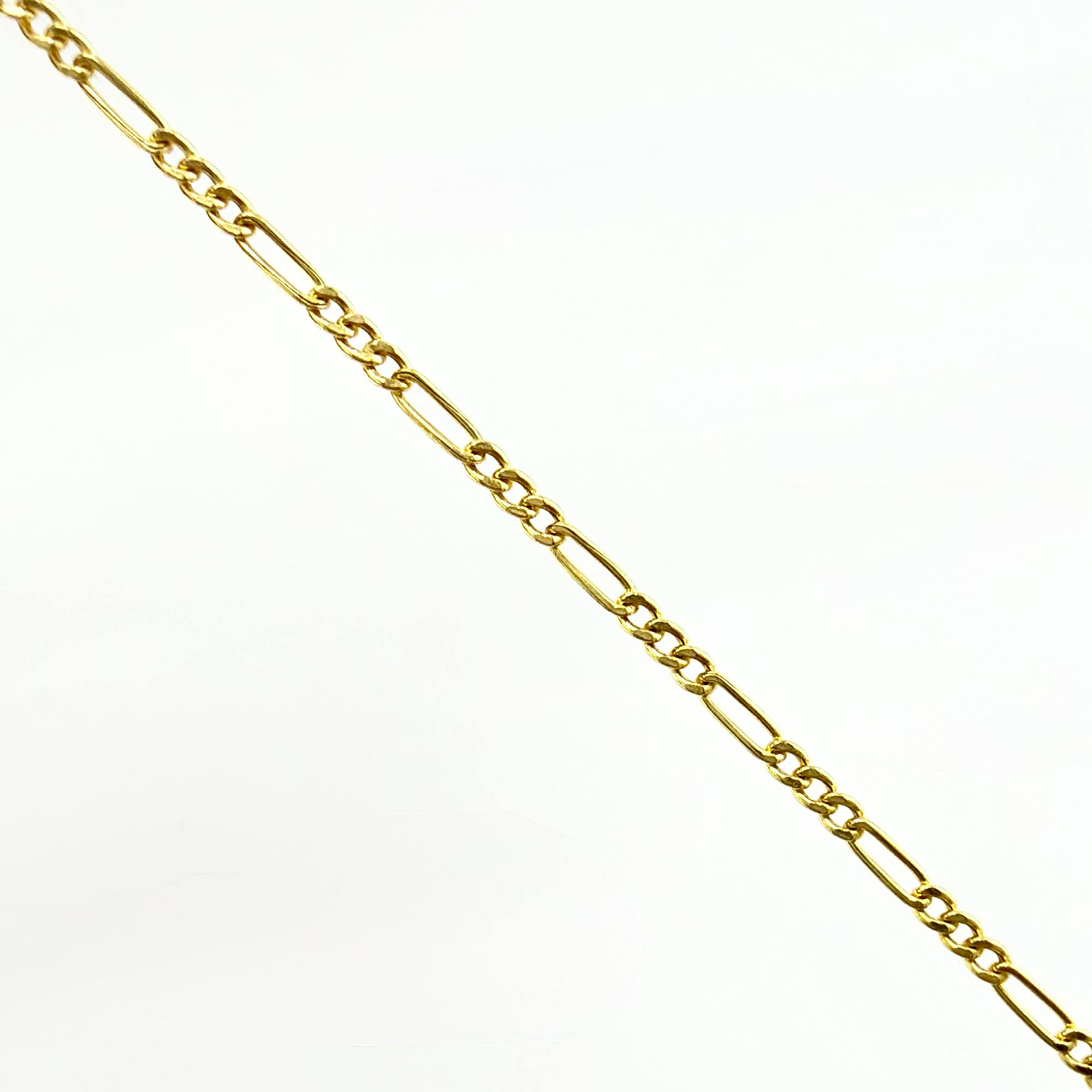 Cadena Figaro 1.35gr / 17 3/4 in / 1.5mm Oro Amarillo +1 18K ©