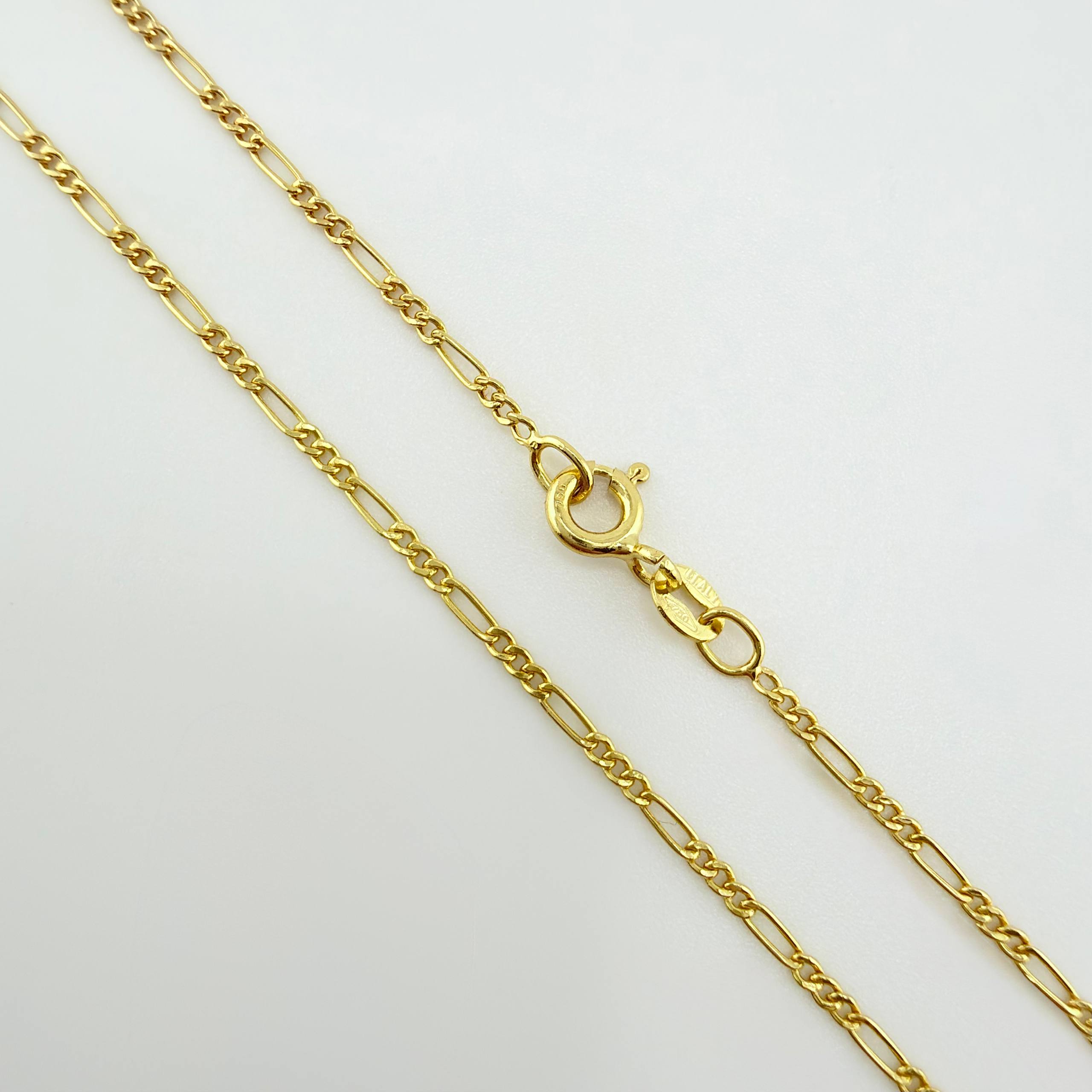 Cadena Figaro 1.7gr / 23 1/2 in / 1.4mm Oro Amarillo +1 18K