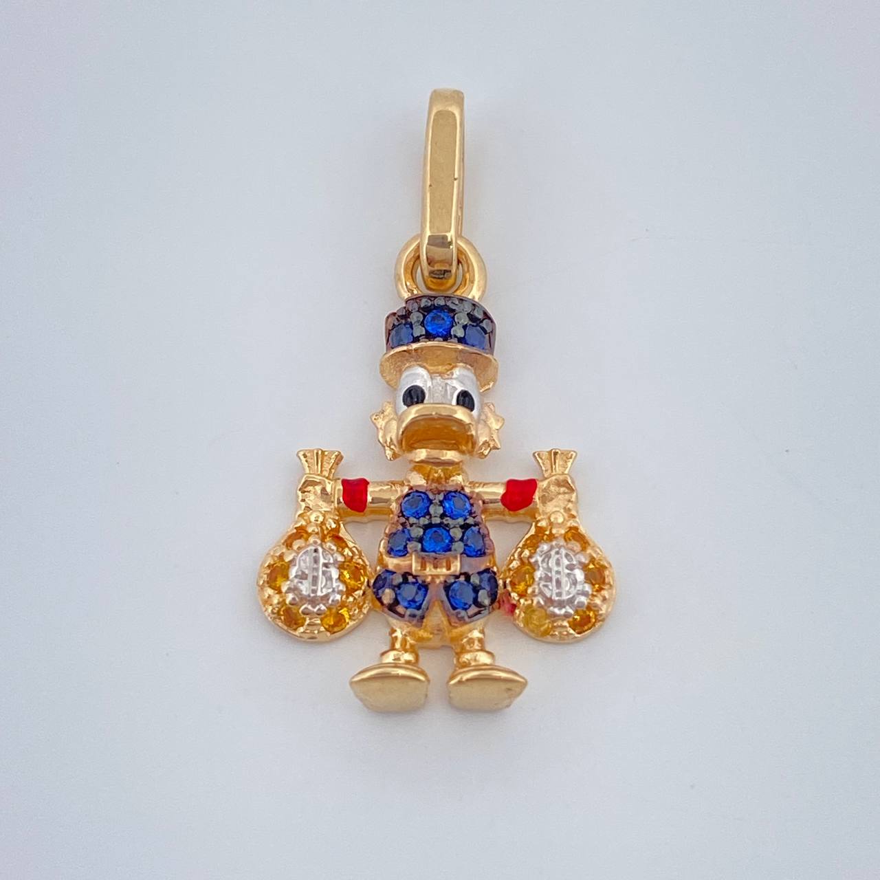 Dije Pato Bolsa Dinero 1.6gr / 3/4 in /  Tres Oros  18K %