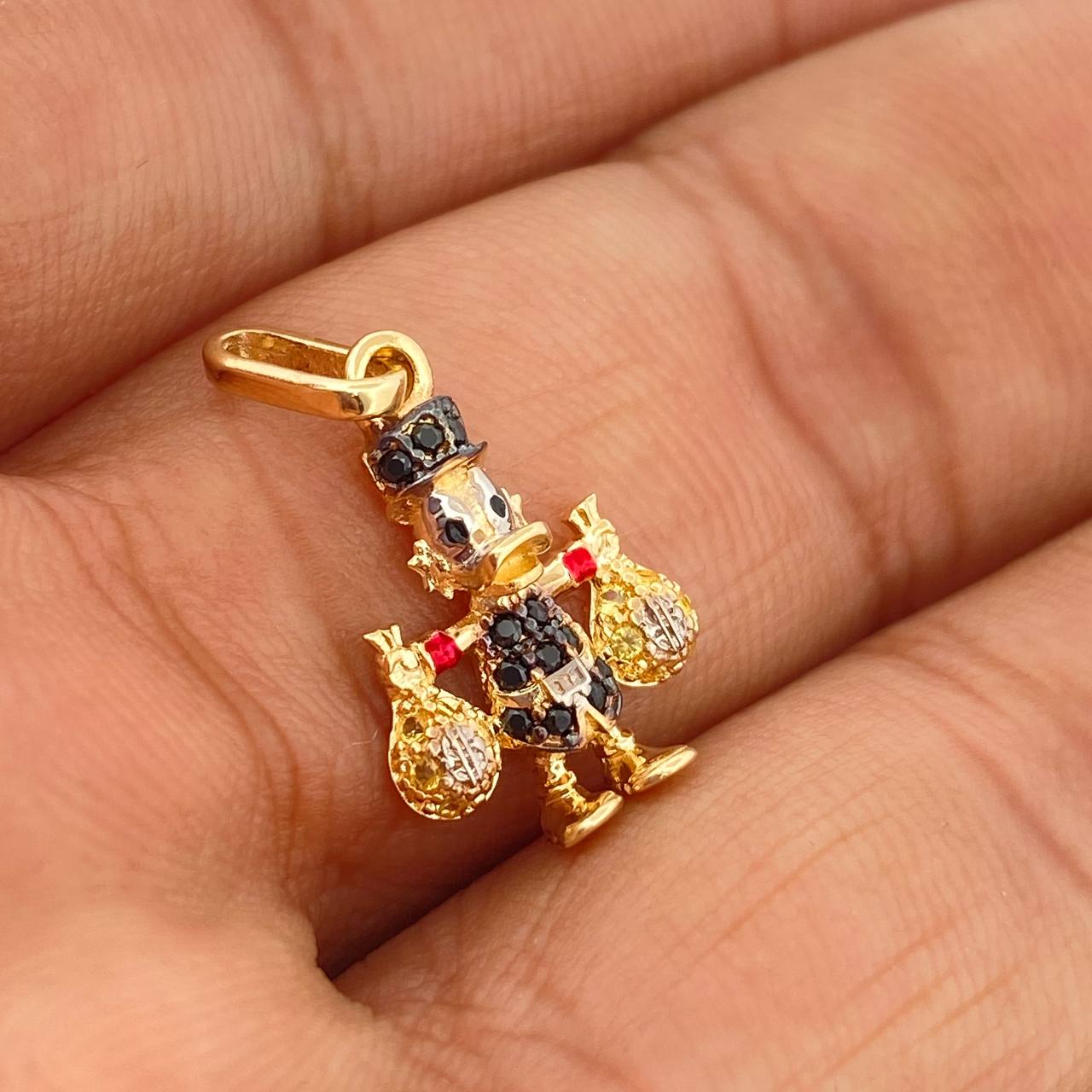 Dije Pato Bolsa Dinero 1.55gr / 3/4 in / Tres Oros 18K %