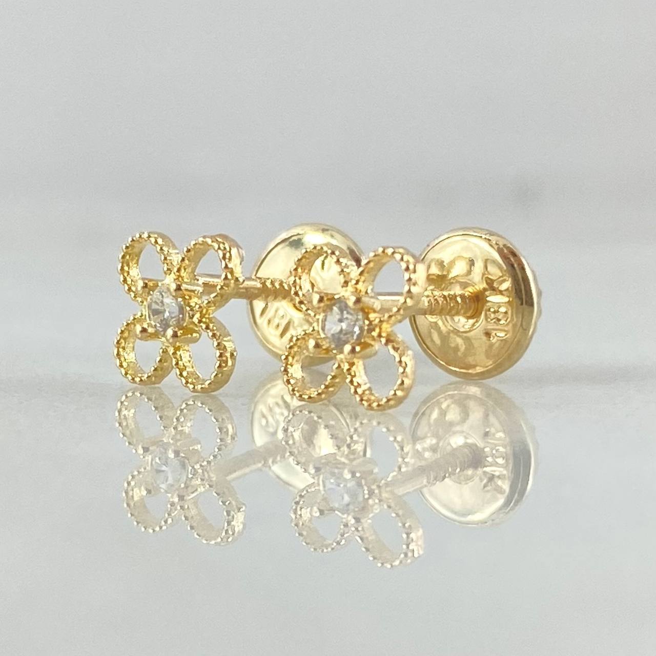 Topos Flor  0.65gr / Oro 18K ©