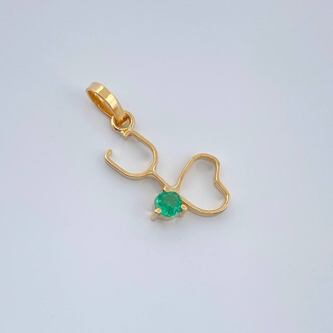 Dije Figura Fonendoscopio Esmeralda 07Pts 0.4gr / 3/4 in / Oro Amarillo 18K %
