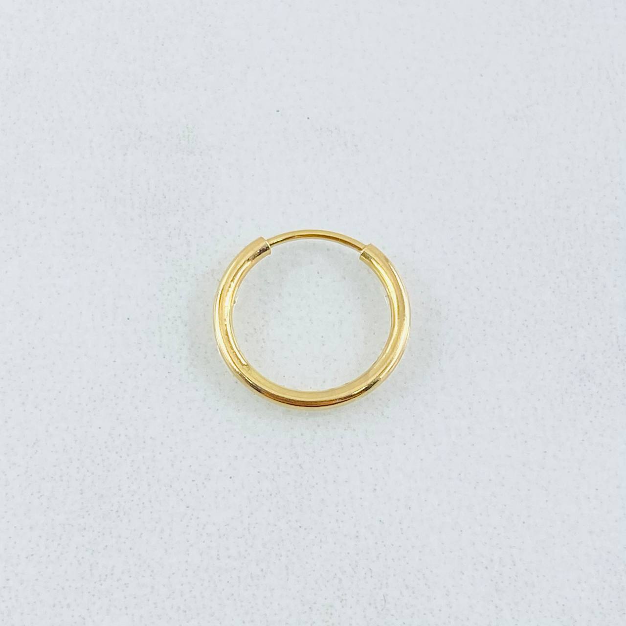 Piercing Aro Liso 0.25gr / 1/2 in / Oro Amarillo 18K