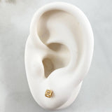 Topos Cubo 0.7gr / Oro 18K ©
