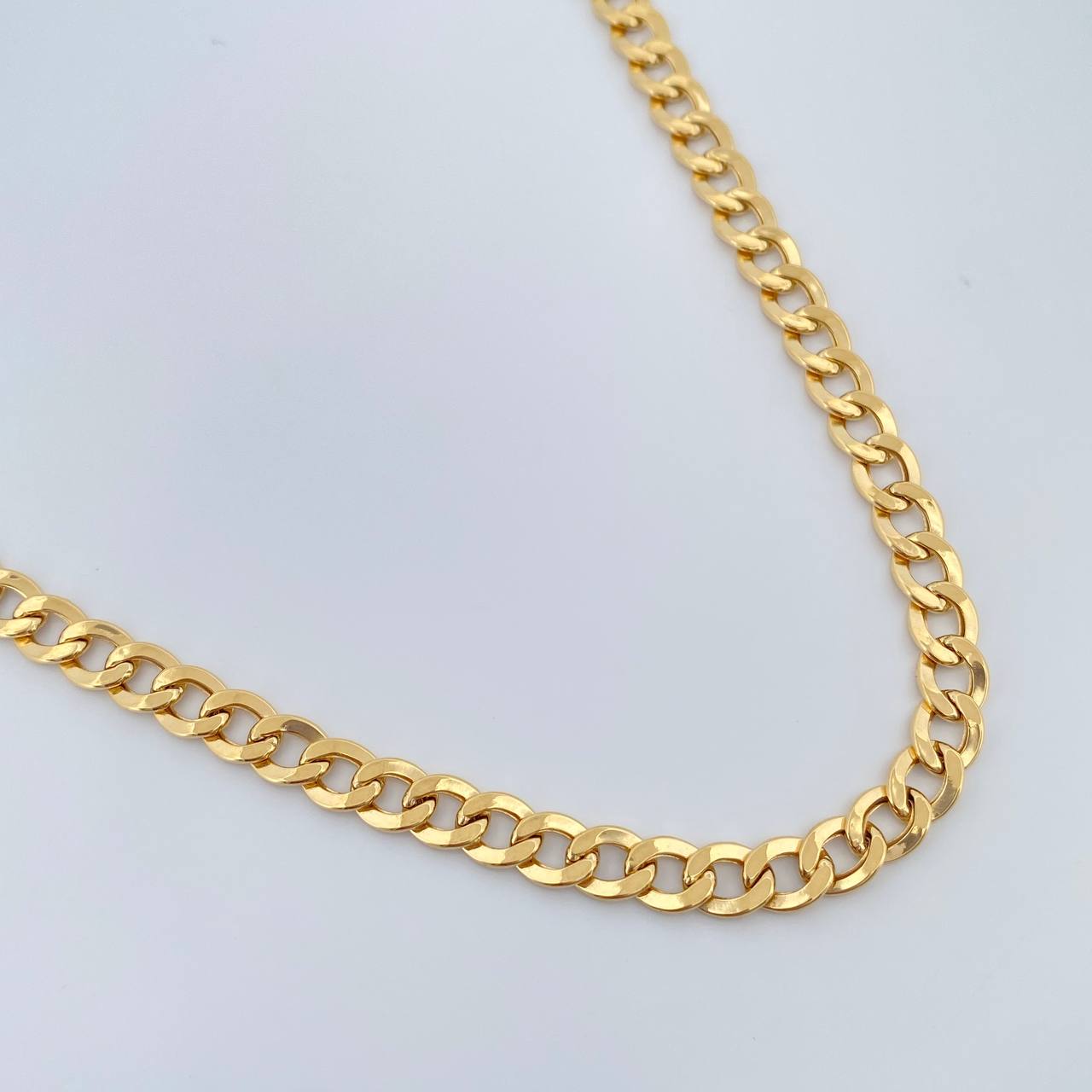 Cadena Cubana 12.8gr / 24 in / 5.7mm Oro Amarillo +1 18K %