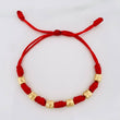 Red Woven Bracelet 7 Knots 6 Diamond Cut Cylinders Yellow Gold 18K