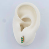 Topos Trio Esmeraldas 1.2gr / 7.4mm Oro Amarillo 18K %