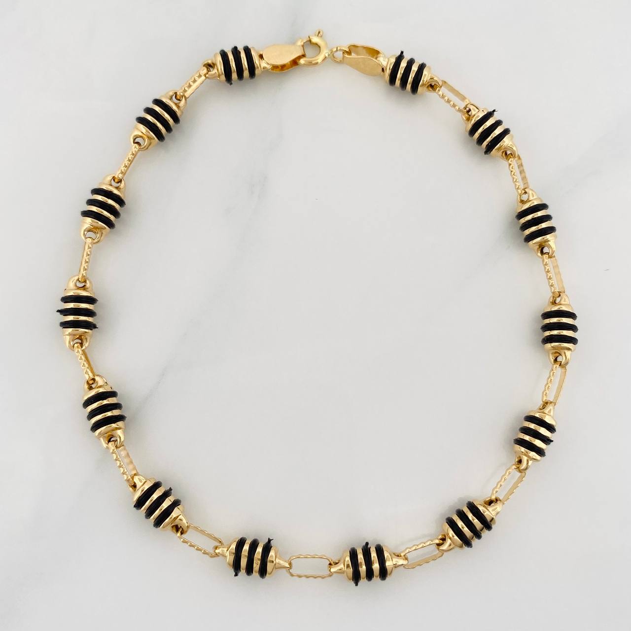 Pulso Rustico Barril 4.7g / 8 1/4 in / 4.2mm Oro Amarillo 18K