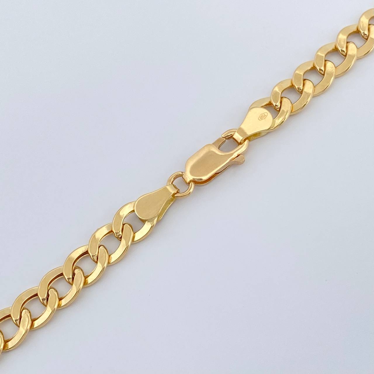 Cadena Cubana 12.4gr / 24 1/4 in / 5.75mm Oro Amarillo +1 18K %