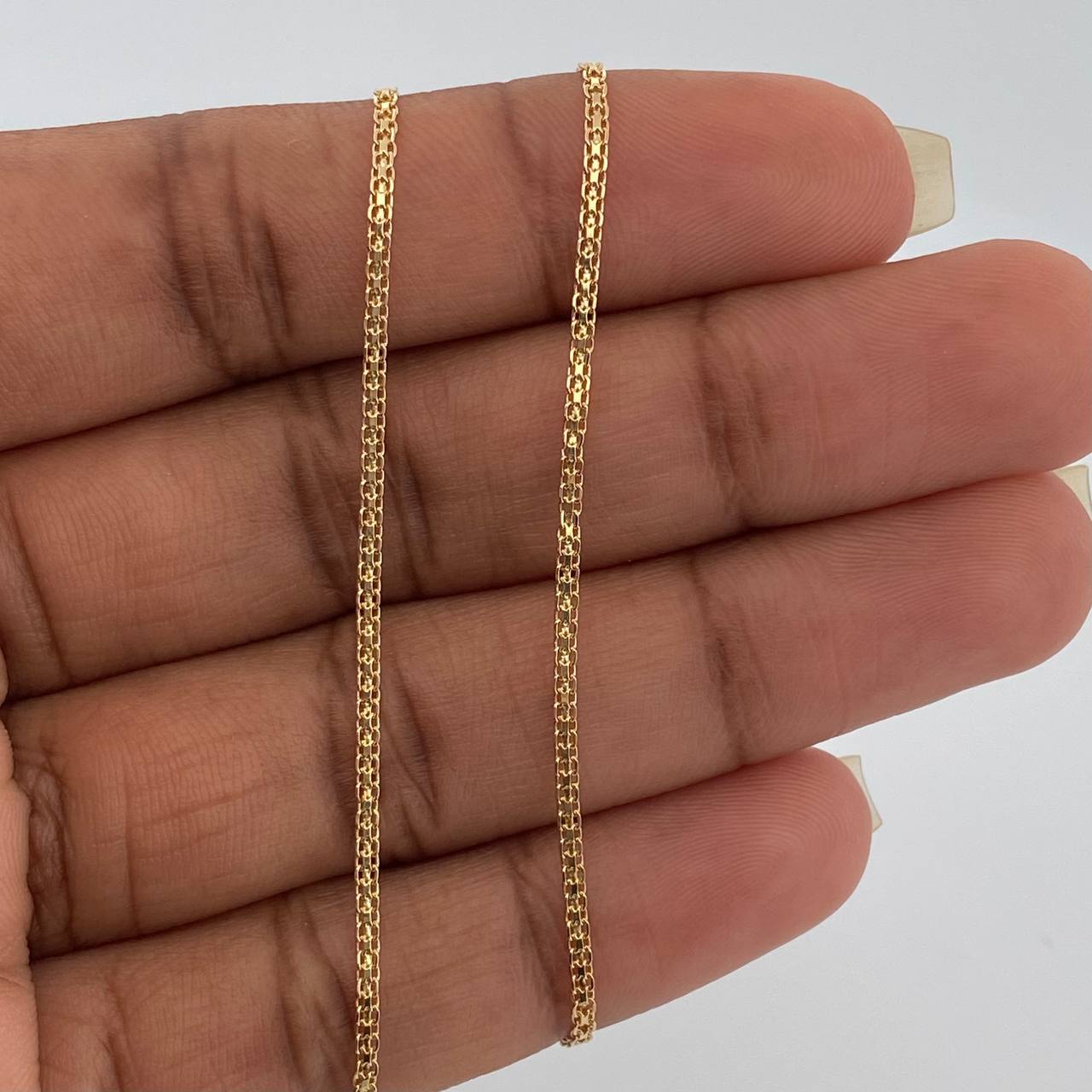 Cadena China 2.1gr / 15 3/4 in / 1.46mm Oro Amarillo +1 18K %