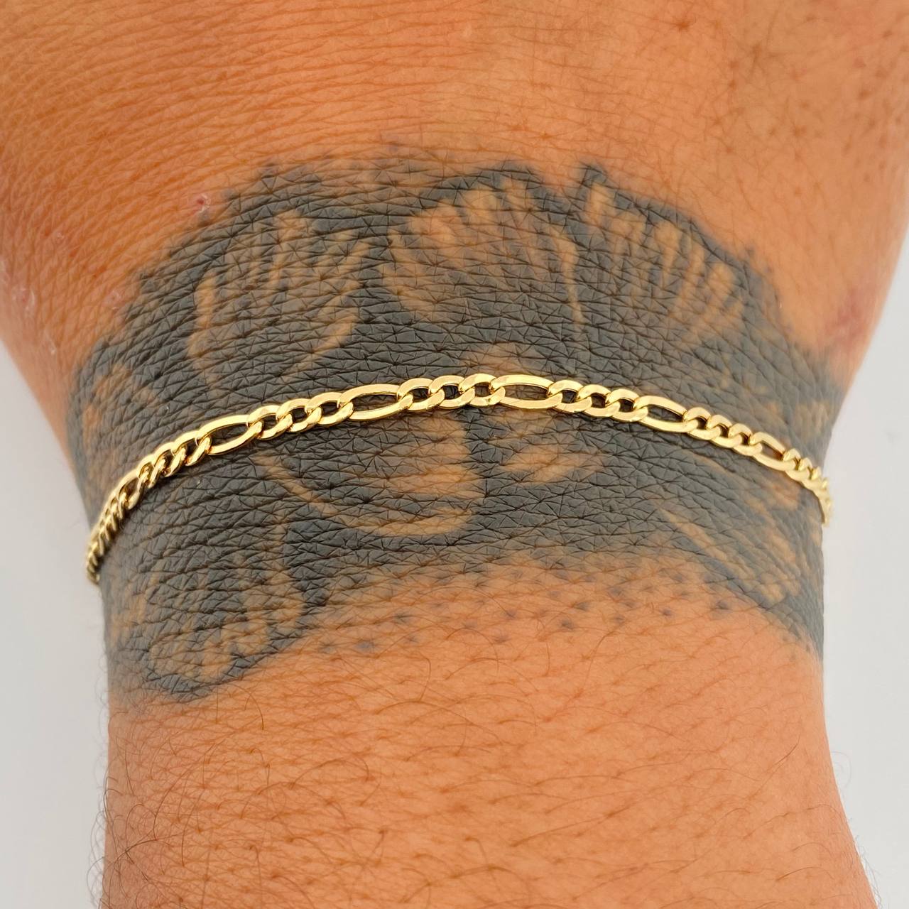 Pulso Figaro 1.4gr / 7 1/2 in / 1mm Oro Amarillo +1 18K &