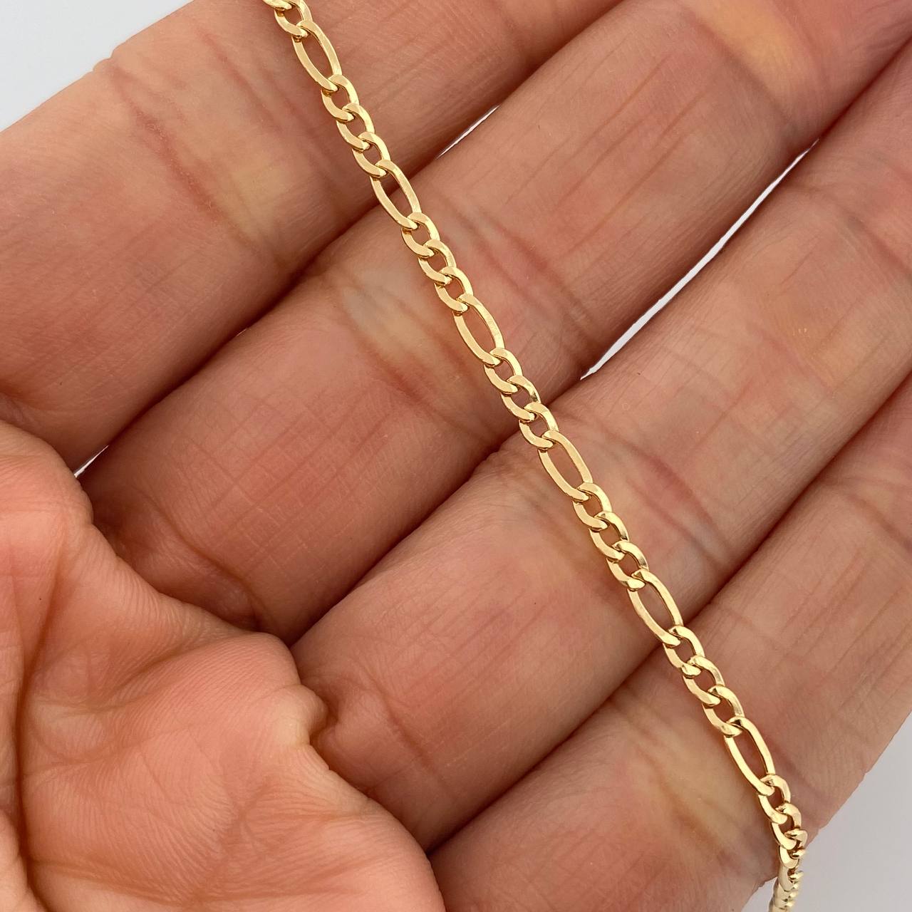 Pulso Figaro 1.4gr / 7 1/2 in / 1mm Oro Amarillo +1 18K &