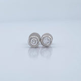 Topos Bisel Diamantes 1.45gr / 5.11mm Oro Blanco 18K %