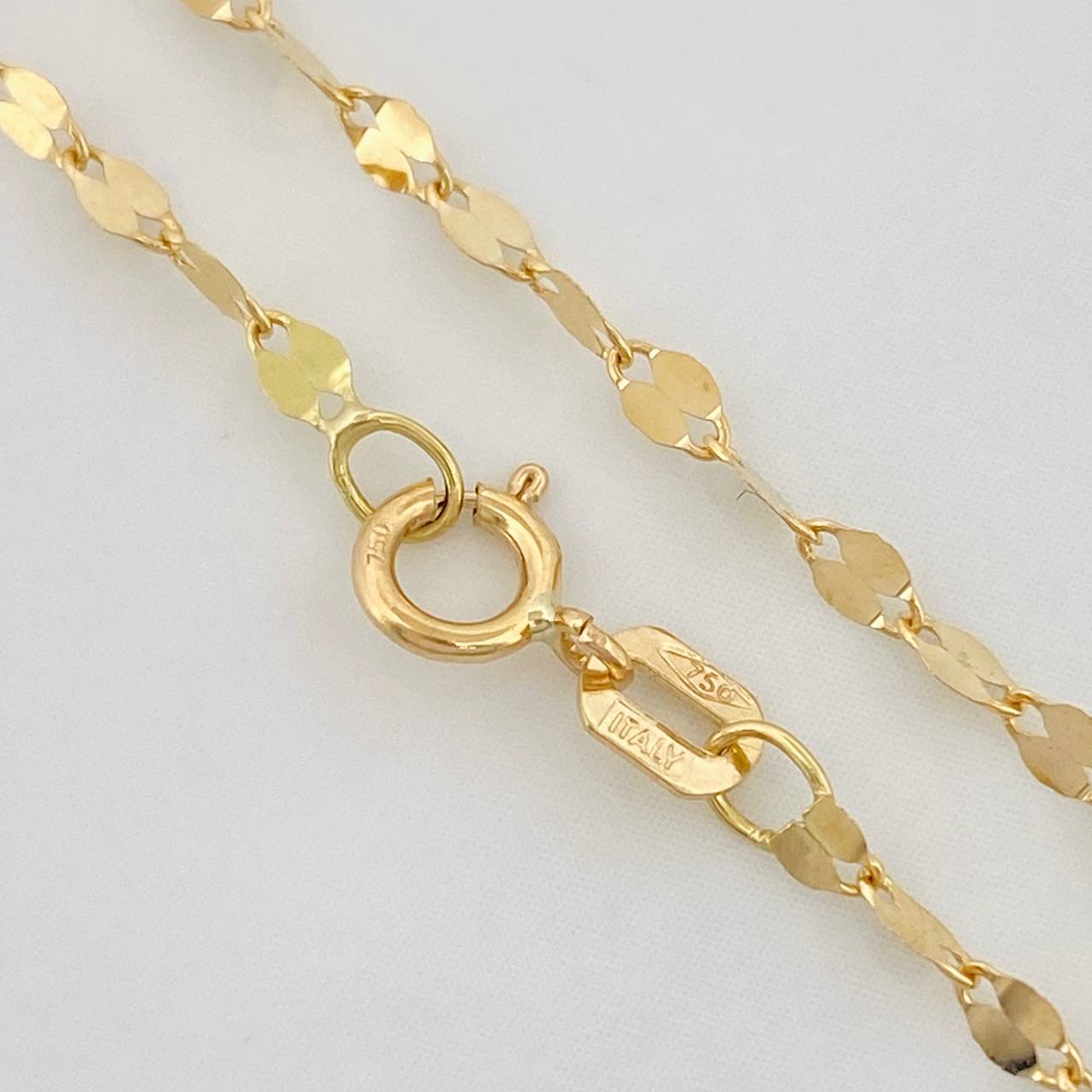 Cadena Flor Espejo 1g / 18 in / 1.1mm Oro Amarillo 18K