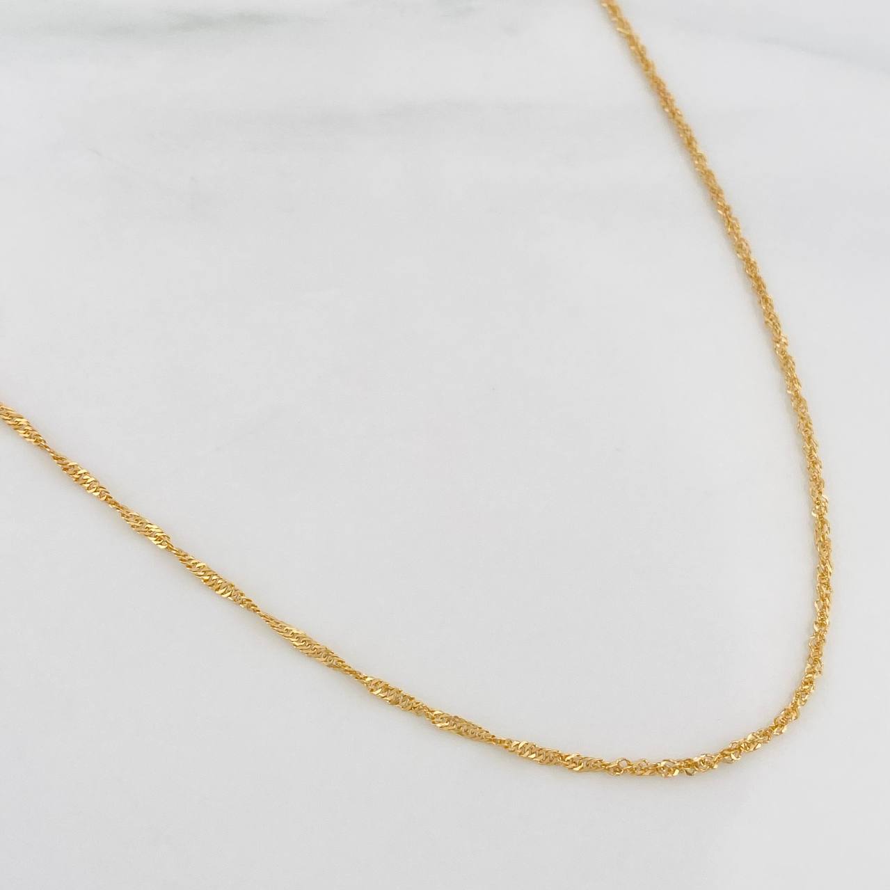 Singapore Chain 1.4g / 18 in / 1.1mm Yellow Gold 18K