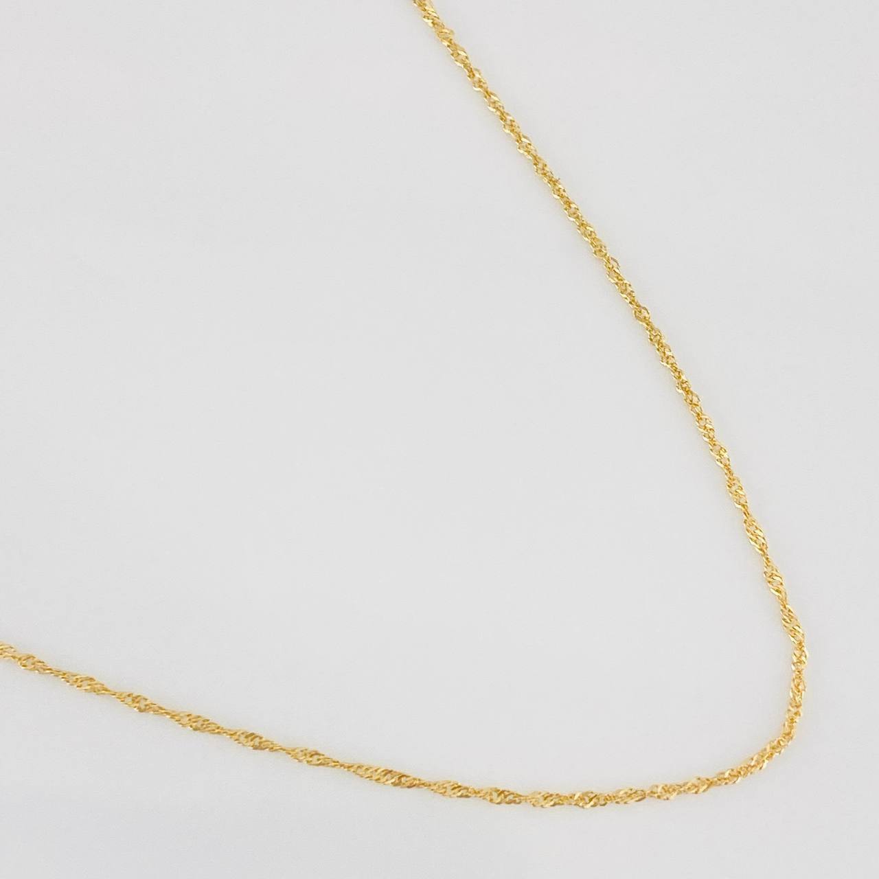 Cadena Singapur 0.9g / 20 in / 0.55mm Oro Amarillo 18K