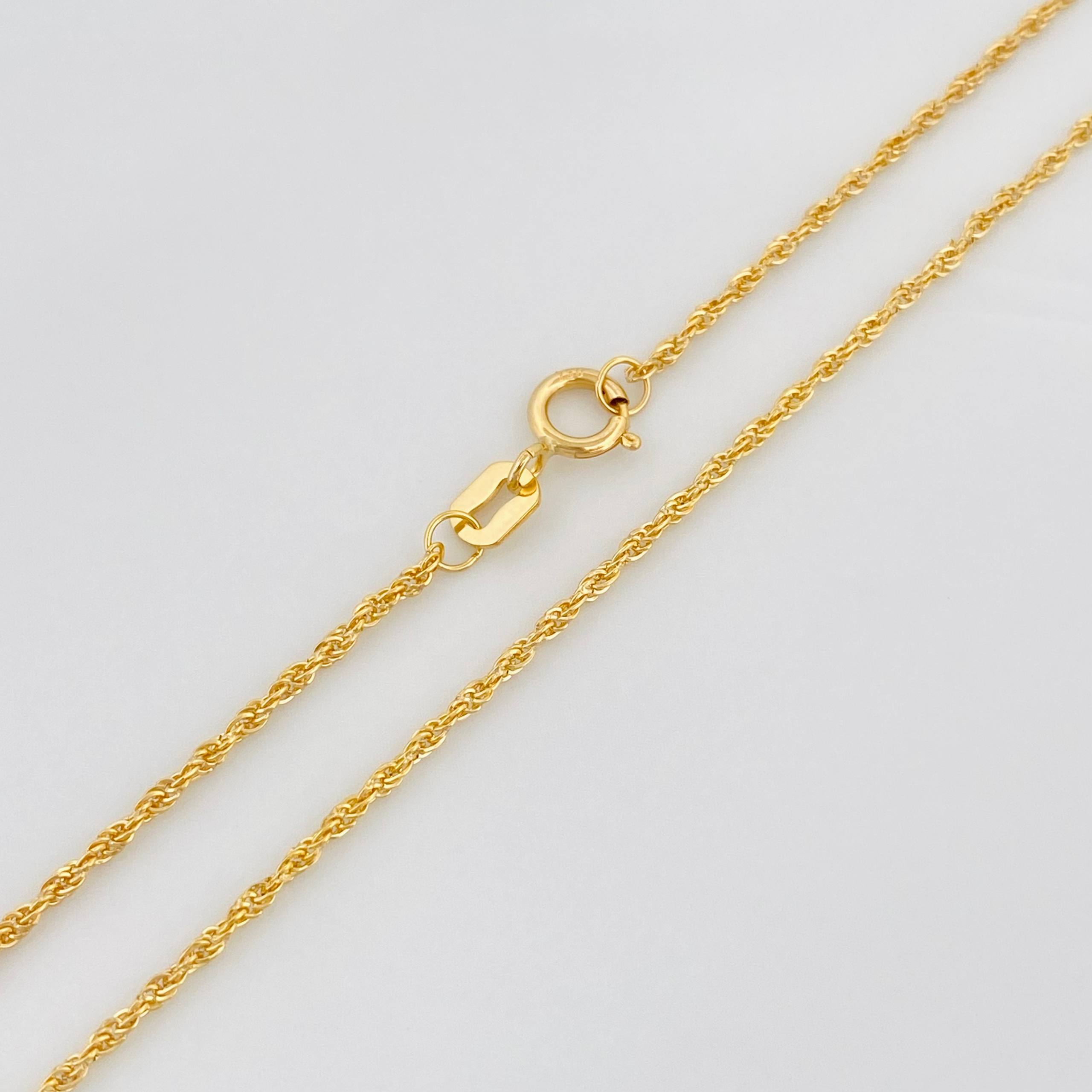 Set Cadena Lazo + Dije Corona / 1.5 g / 19 3/4 in Oro Amarillo 18K