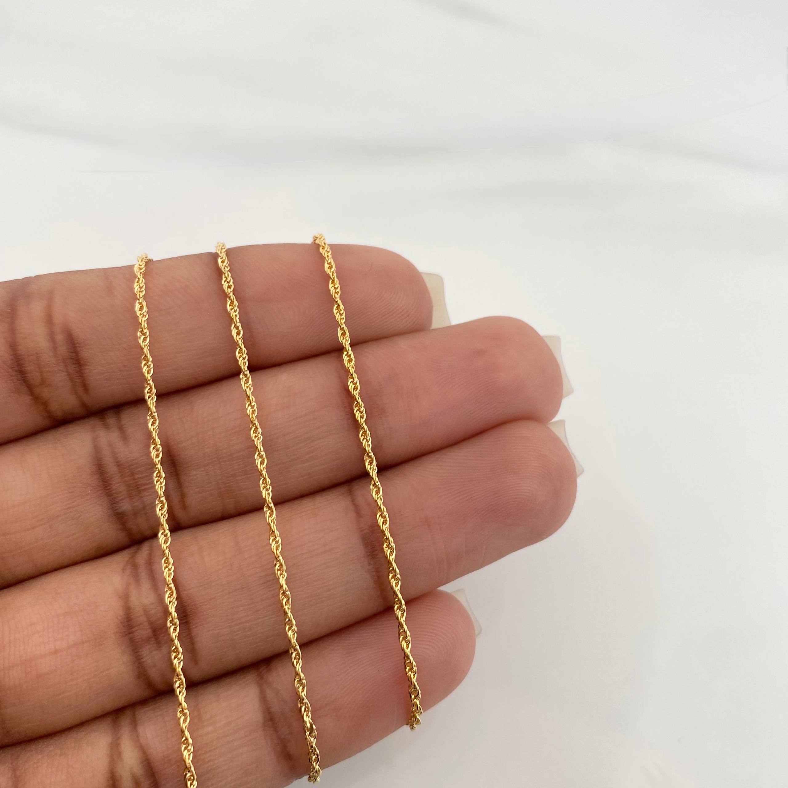 Set Cadena Lazo + Dije Cruz / 1.85 g / 17 3/4 in Oro Amarillo 18K