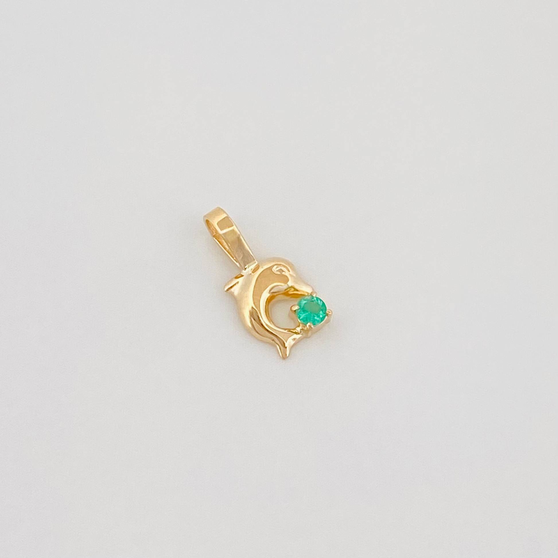Dije Delfin Esmeralda 0.3Pts 0.2 g / 1/2 in Oro Amarillo 18K