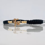 Pulsera Tejida Negra Fe Bolas Diamantadas Oro Amarillo 18K