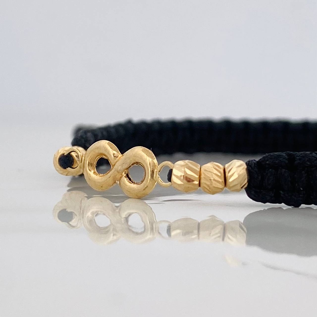 Black Woven Bracelet Infinity Diamond Cut Beads Yellow Gold 18K
