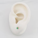 Topos Cuatro Garras Esmeralda 0.10Pts 0.55 g / in / 2.13 mm Oro Amarillo 18K