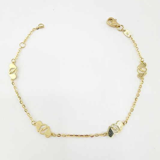 Pulso Aro Seguido Corazones Cruzados 1.95gr / 7 1/2 in / 1.2mm Oro Amarillo +4 18K ©