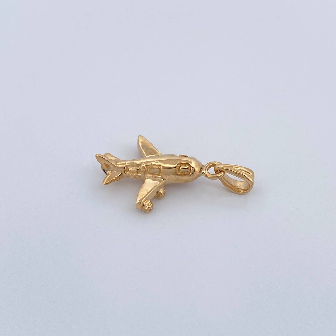Dije Avion 1.6gr / 3/4 in / Oro Amarillo 18K %