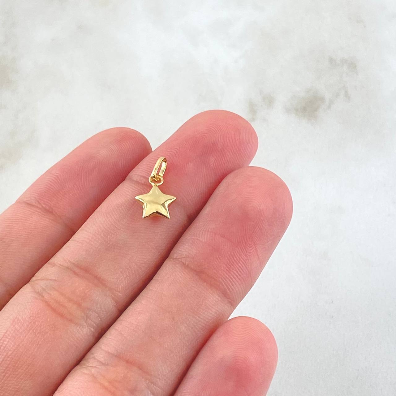Dije Estrella 0.25gr / 1/2 in / Oro Amarillo 18K *