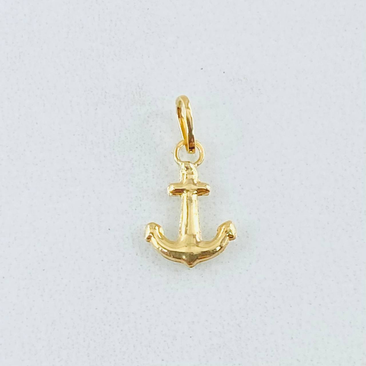 Dije Ancla 0.3gr / 1/2 in / Oro Amarillo 18K